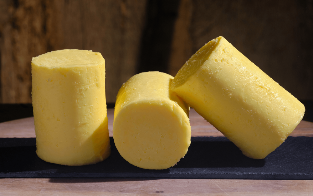 Longmans Salted Butter presented in a set of three with different angles.