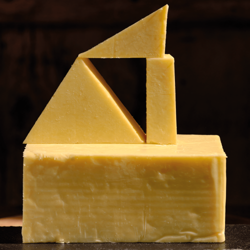 Longmans cheddar cheese presented in four different shapes.